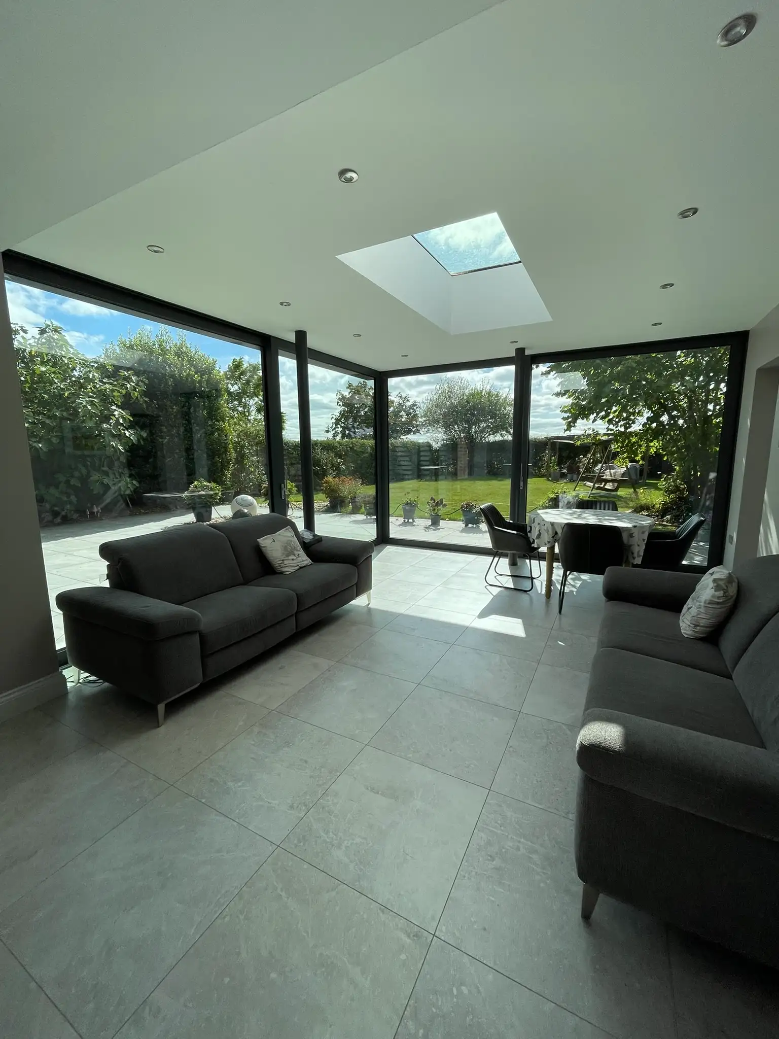 Inside a finished garden room looking out to the garden